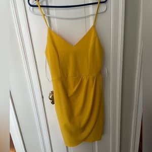 Lulus yellow mini faux wrap dress.